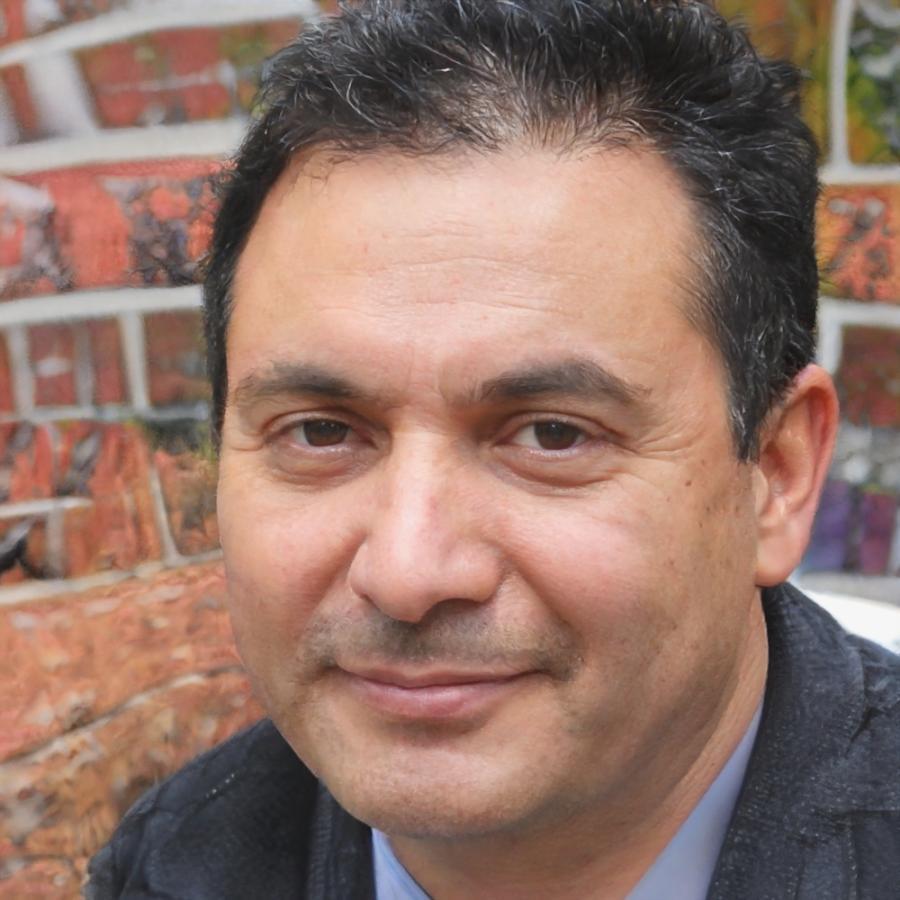 Senior financial modeling instructor reviewing client materials